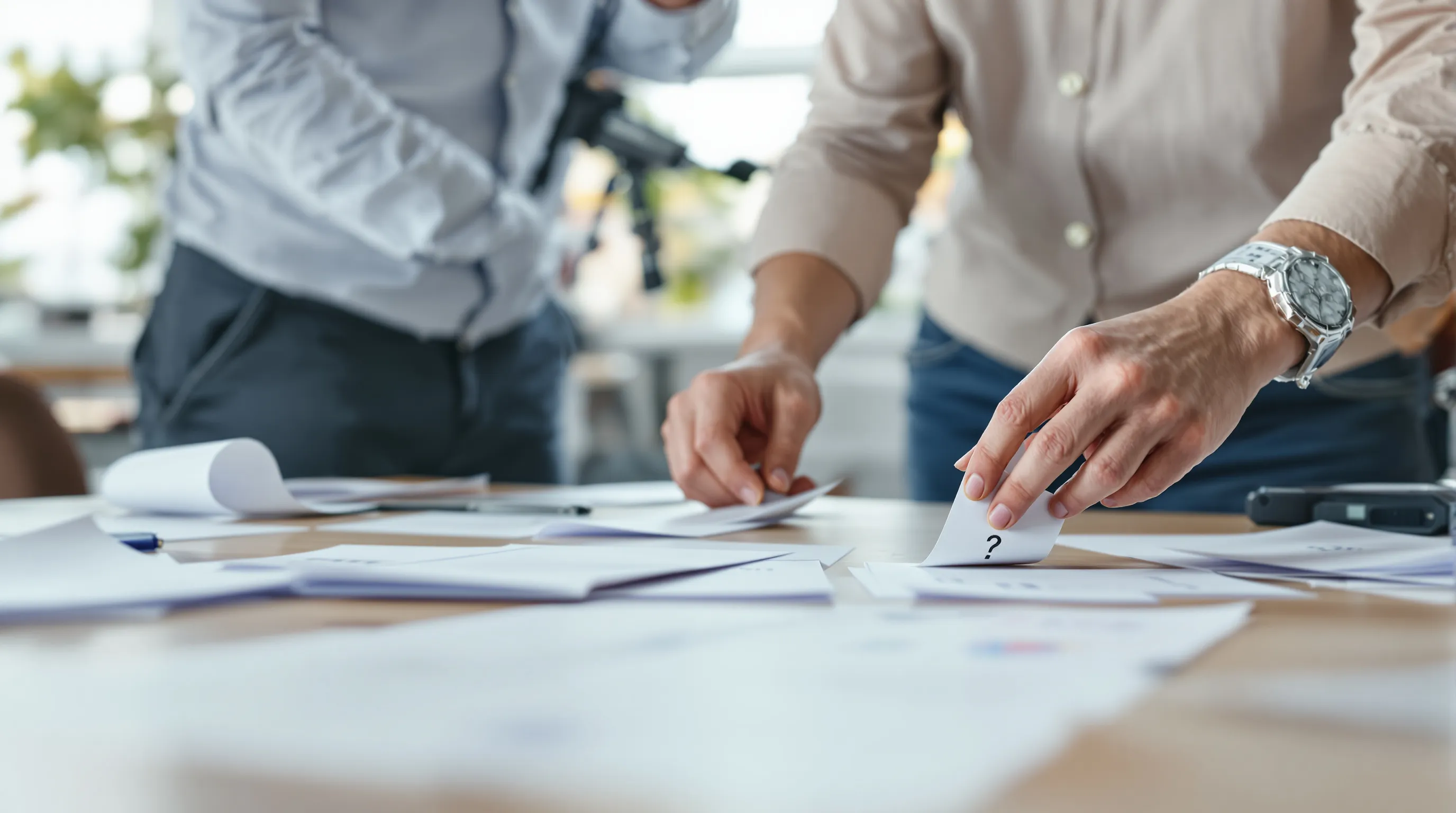 Support team sorting sales call notes and tickets into individual buyer questions